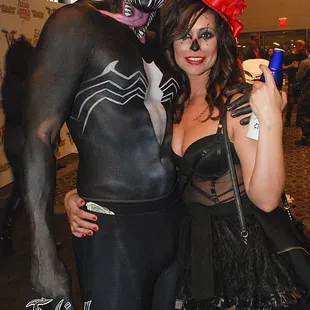 a man and a woman dressed in costumes