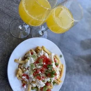 Big boy mimosas, Feta frys, &amp; Pesto caesar salad