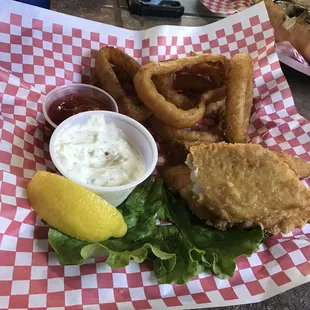 Fish and chips we onion rings, lots of tarter sauce and it is great!