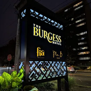 Outside. Street sign on Piedmont Road. Fia Restaurant is located inside the Burgess Hotel. Free self-parking around the building.