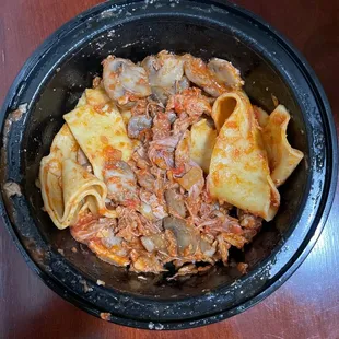 ......literally just plain tomato sauce, overcooked noodles, ripped up lumps of duck meat and slices of cheap baby Bella mushrooms.