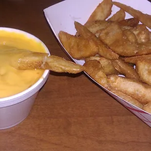 Western fries with cheese on side