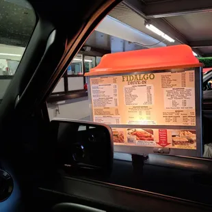 a menu in the back of a car