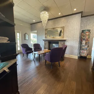 a living room with a fireplace