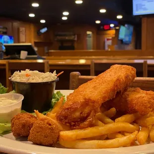 Thursday Fish Fry served with fries, slaw and hush puppies.