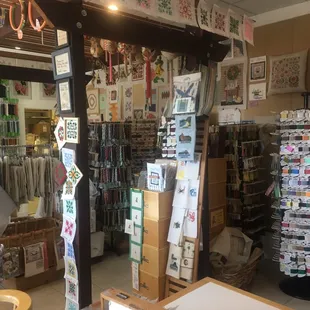 Interior of store, showing some small canvases