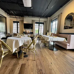 tables with white tablecloths