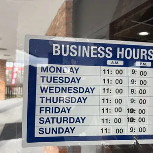 a business hours sign