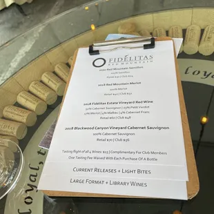 a menu on a glass table