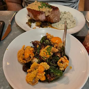 Pork Chop and fried oysters and Brussels