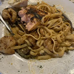 Cajun pasta with shrimp and salmon. You can pick your proteins. So Damn Good! And they give you soo much, you'll have enough for later.