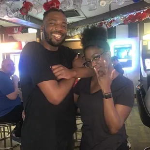 a man and a woman posing for a picture