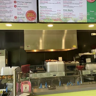 a restaurant counter with menus