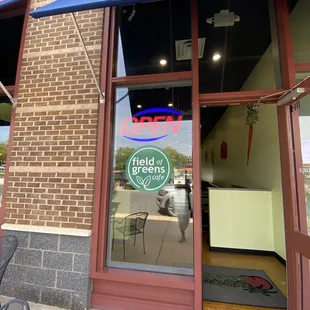 the entrance to a restaurant