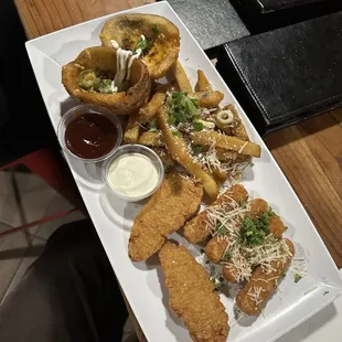 Chicken tenders, potato skins, and mozzarella sticks