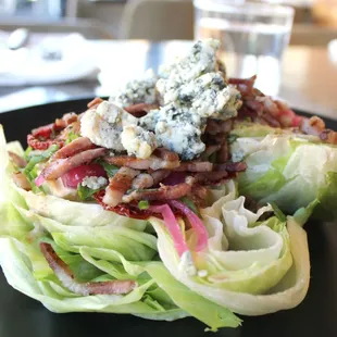 Wedge | gf Grilled bacon. Dried tomatoes. Pickled red onions. Blue cheese crumbles. Crisp Iceberg. Chipotle blue cheese ranch