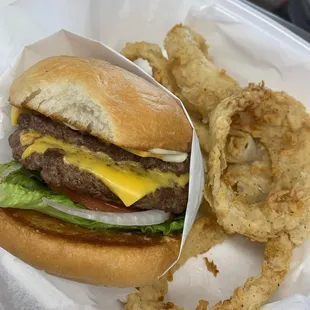 Double meat cheeseburger and onion rings