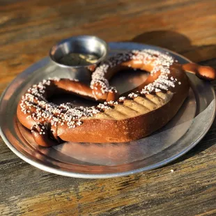 Fresh pretzel with spicy mustard