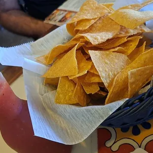  basket of chips and a drink