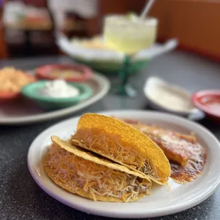 Ground beef tacos and cheese enchilada