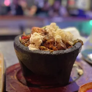 a bowl of mexican food
