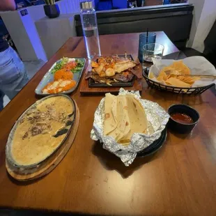 Parrrillada and steak fundido Mexican mule