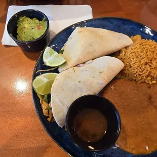 Pick 2 combo two tacos with rice and refried beans