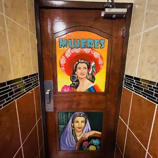 Women&apos;s bathroom door