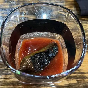 Shot of the homemade Bloody Mary mix with a grilled jalapeño to chase your tequila shot. Excellent!