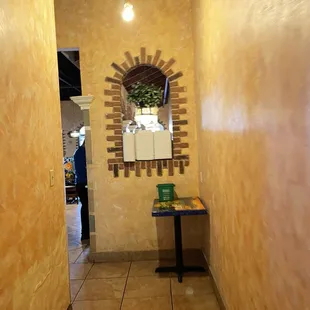 Hallway to bathrooms