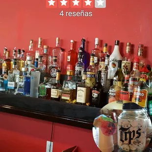 a bar full of liquor bottles