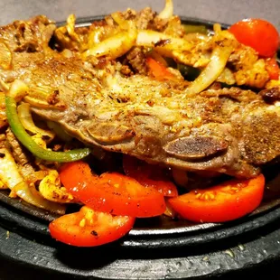 Beef fajita ribs "grilled to perfection".  Not even close.  Rubbery and barely edible.  Another disappointment from Fiesta Cozemel.