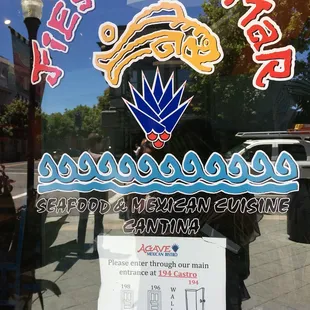 This is what is posted on the door of Fiesta Del Mar (Castro). It's basically telling us to enter Agave Mexican Bistro - AND EAT THERE TOO.
