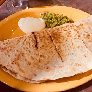 Vegetarian quesadilla with mole sauce