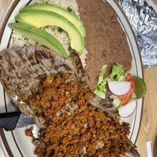 Steak with chorizo rice and beans