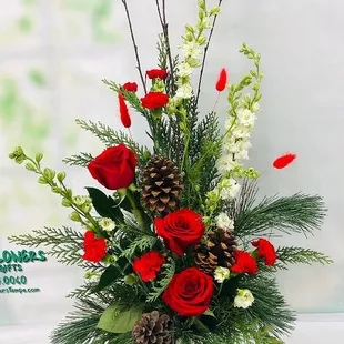 https://fiestaflowersaz.com/product/winter-forest-bouquet-h-7082/