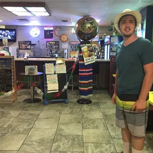 a man standing in a mexican restaurant