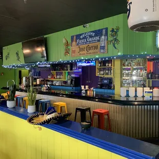 a brightly colored bar with neon lights