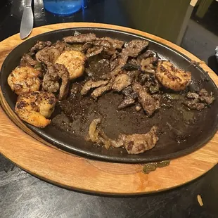 Greasy and burnt meat fajitas