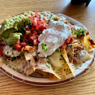 Deluxe nachos with carnitas