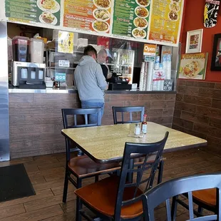 a man standing at the counter