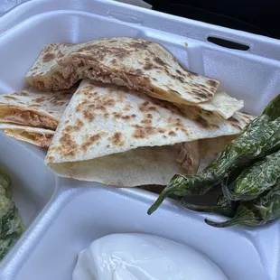 Chicken quesadilla with some chiles. Gotta have the chiles
