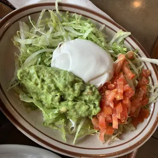 Guacamole. Tomato. Lettuce. Sour Cream