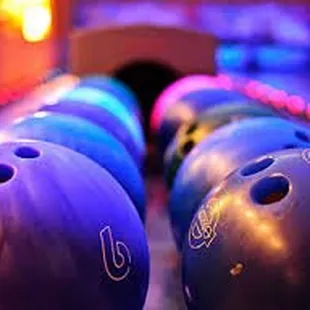 bowling balls lined up in a row