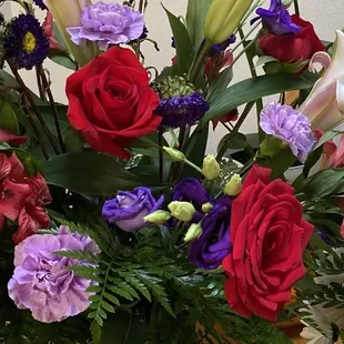 You can see the purple roses are wilting and most of the purple flowers are drooping. Depressing looking.