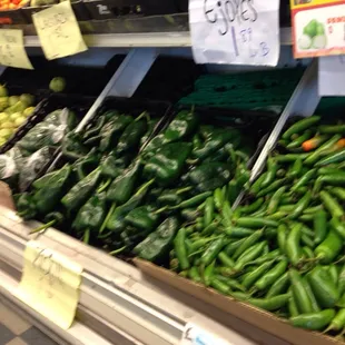 a variety of peppers in a grocery store