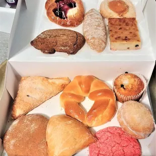 a variety of pastries in a box