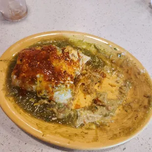 The chili verde burrito was perfect  tender meat green sauce it was a very large portion burrito that I definitely could not finish .