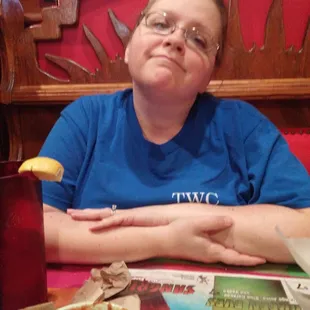 a woman sitting at a table