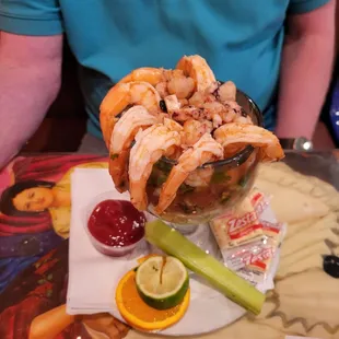 Shrimp Cocktail.  Shrimp, octopus,  and crab sitting in a salsa. Heat and seafood.  Win win for me.